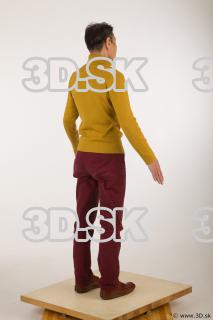 Whole body yellow sweater red trousers brown shoes of Sidney…